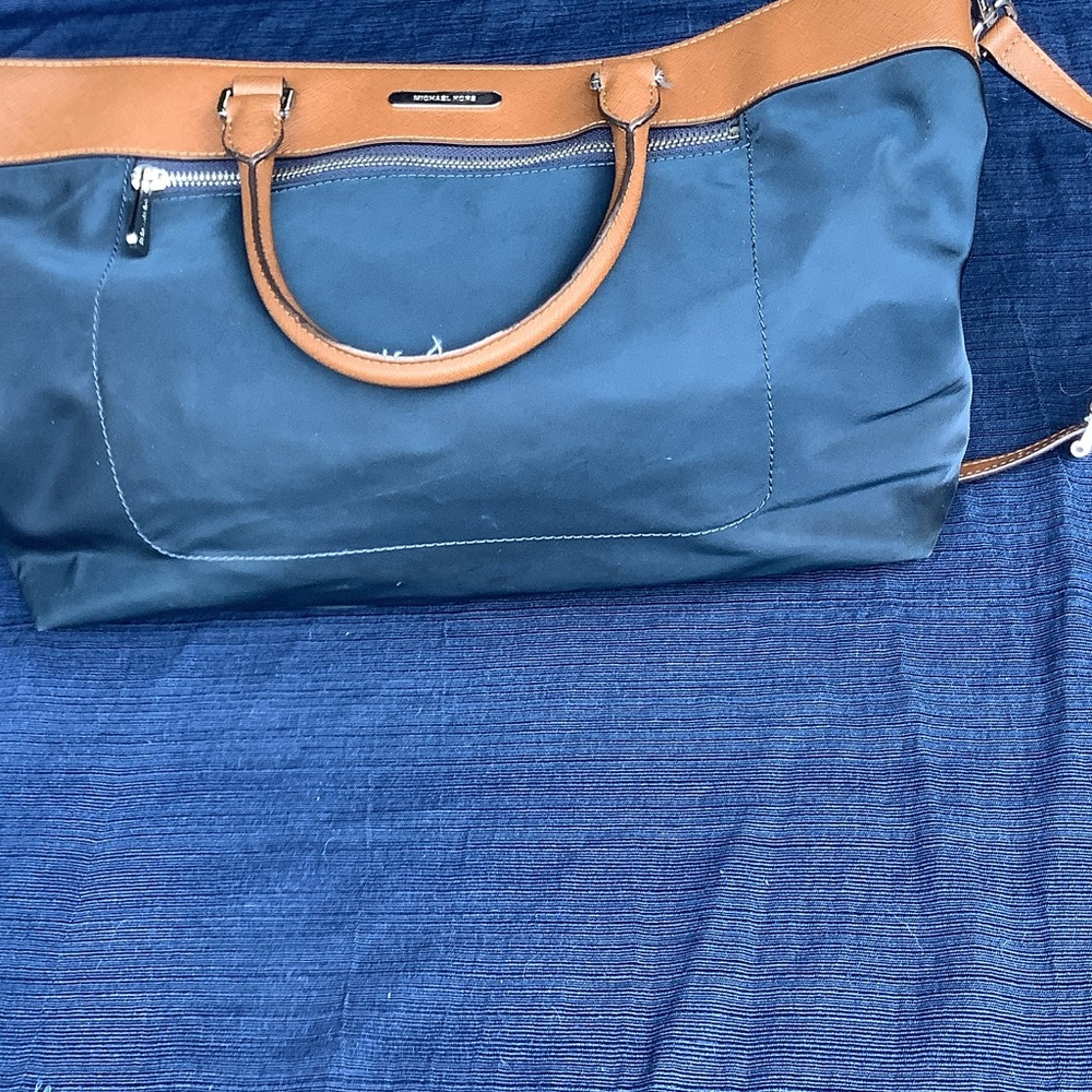 Michael Kors navy and tan bag.